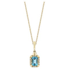Sunita Nahata topaze bleue suisse 1.35 carats. Pendentif en 14 carats avec diamant blanc.