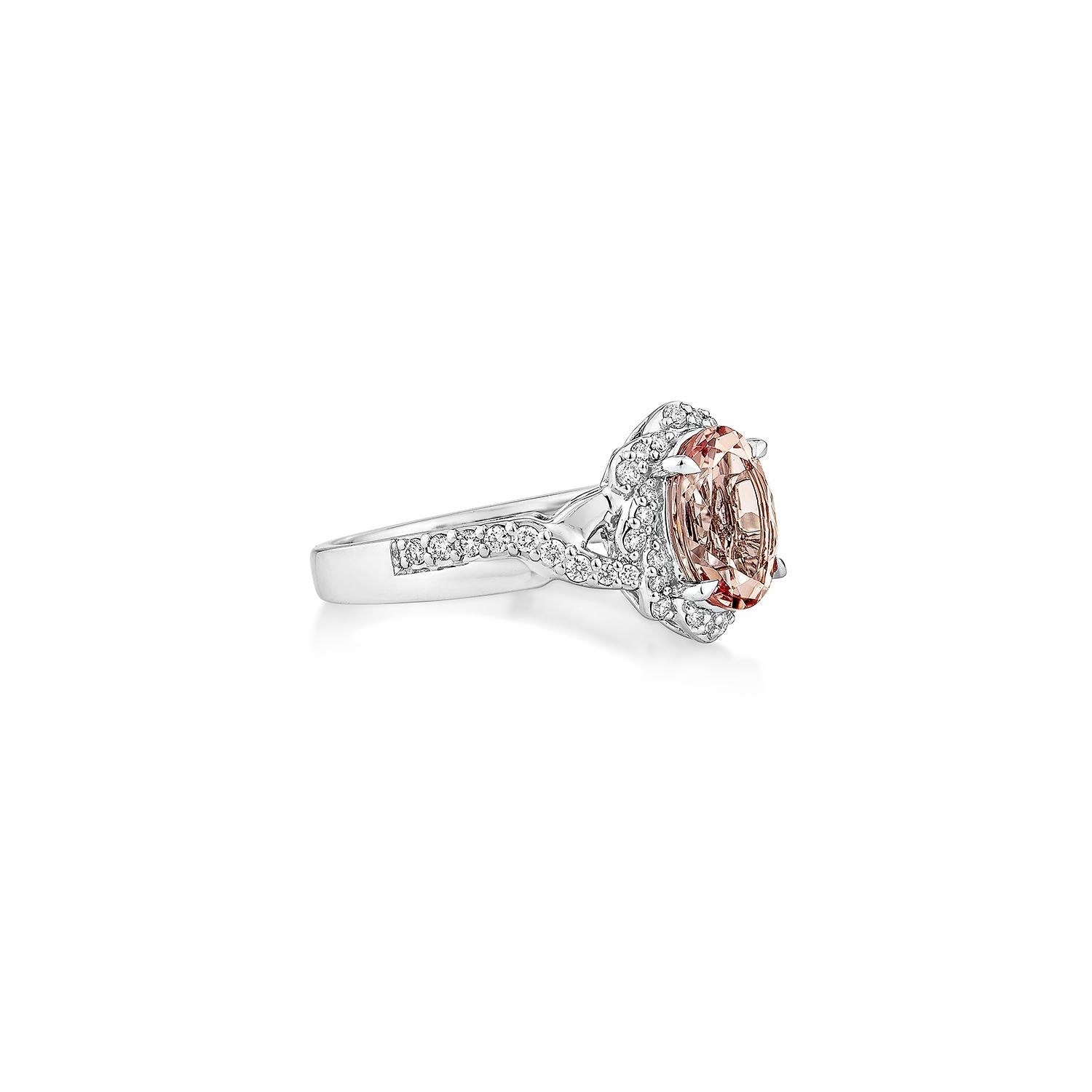 This collection includes a range of Pink Morganite, which is a symbol of love and relationships, making it an excellent choice for a variety of applications. Accented with White Diamond this ring is made in White Gold and present a classic yet