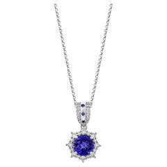 Sunita Nahata Tanzanite et saphir bleu 1.56ct. Pendentif en 18KWG avec diamant.