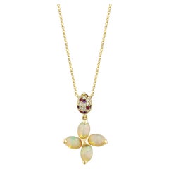 Sunita Nahata opale 1.79 carats. Pendentif en 18 carats avec pierres précieuses mélangées et diamants.