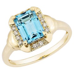 Sunita Nahata Swiss Blue Topaz 1.85ct. Fancy Ring in 14KYG with Diamond.