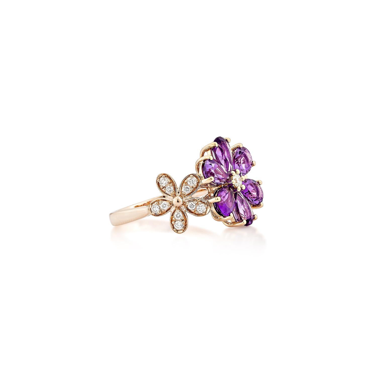 A captivating floral-inspired ring featuring rich pear-cut amethysts in medium and dark hues, forming a blooming flower. Accented with sparkling diamonds and delicate side motifs, all set in warm 14K rose gold. A statement of elegance and