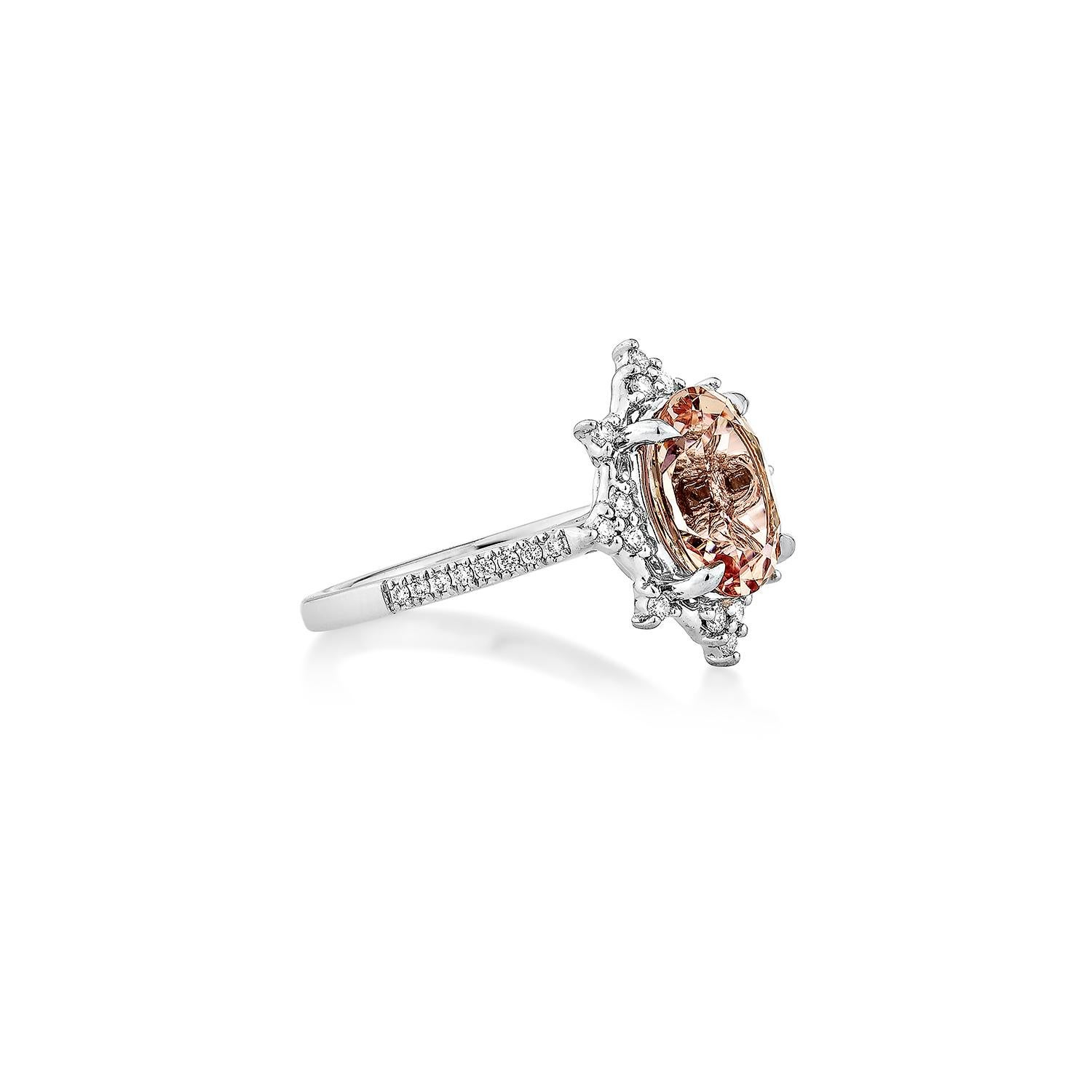 This collection includes a range of Pink Morganite, which is a symbol of love and relationships, making it an excellent choice for a variety of applications. Accented with White Diamond this ring is made in White Gold and present a classic yet