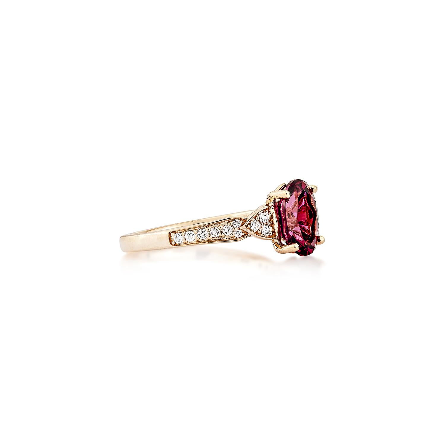 Sunita Nahata presents an elegant Rhodolite fancy ring in an oval shape, set with sparkling white diamonds. This exquisite piece exudes grace and elegance, making it perfect for both daily wear and special occasions. Crafted from 14-karat rose gold,