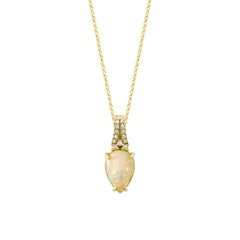 Sunita Nahata Opal 2.37ct. Pendant in 18KYG with White Diamond.