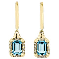 Sunita Nahata topaze bleue suisse 2.40 carats. Pendants d'oreilles en 14KYG avec diamant.