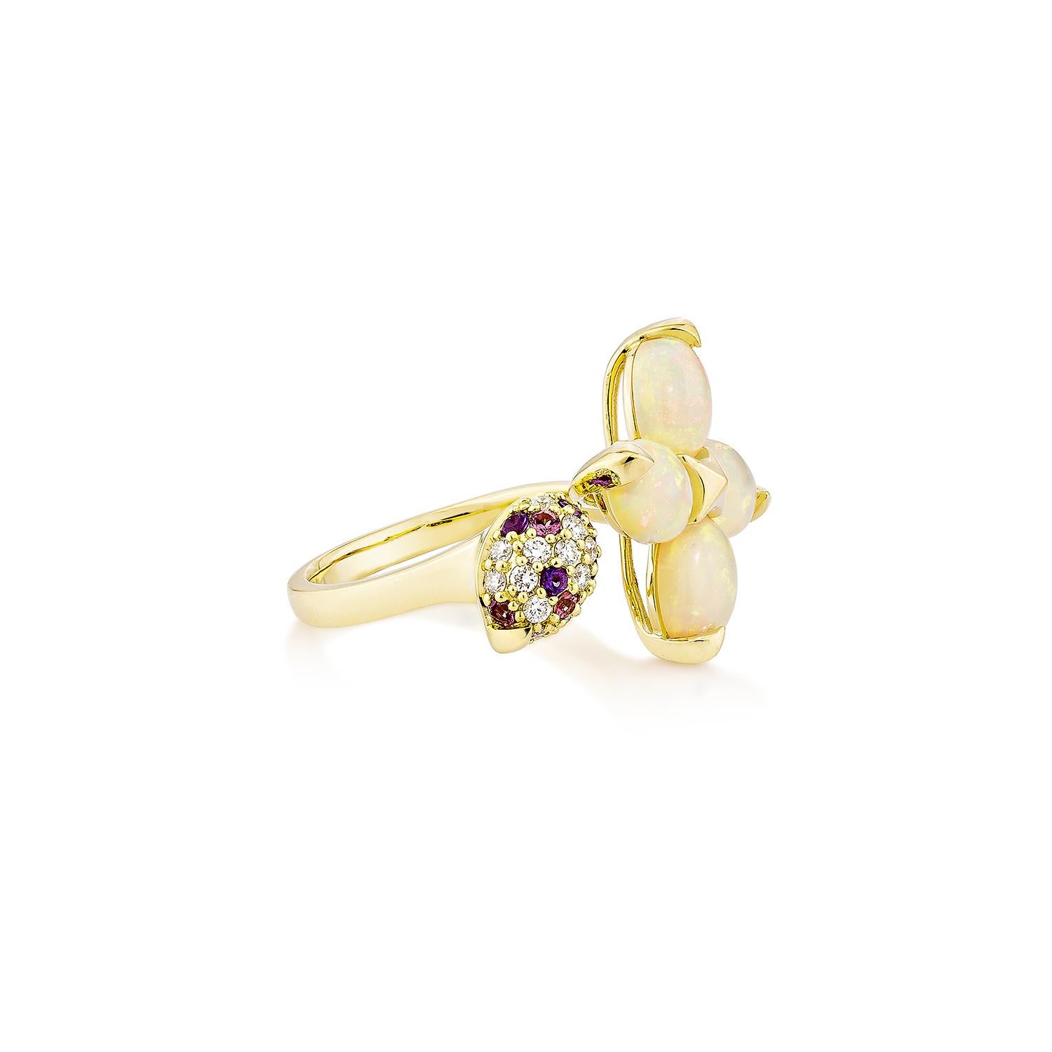 Embrace the enchanting play of colors with this exquisite opal fancy ring, elegant 18Karat Yellow gold. It's iridescent glow and delicate simplicity make it a timeless accessory, perfect for enhancing any ensemble.

Opal Fancy Ring in 18Karat Yellow