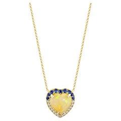 Sunita Nahata Opal and Blue Sapphire 2.48ct. Pendant in 18KYG with Diamond.
