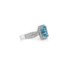 Sunita Nahata Swiss Blue Topaz 2.75ct. Fancy Ring in 14KWG with Diamond.
