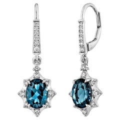 Sunita Nahata London Blue Topaze 2.76 carat Pendants d'oreilles en 14KWG avec diamant.