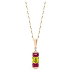 Sunita Nahata Peridot & Rhodolite 2.87ct. Pendant in 18KRG with Diamond.