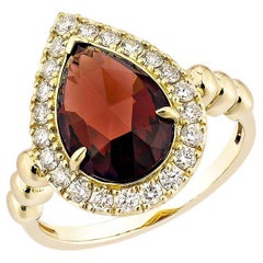 Sunita Nahata Red Garnet 3.10ct. Fancy Ring in 14KYG with Diamond.