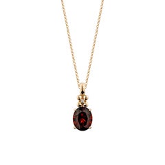 Sunita Nahata Red Garnet 3.23ct. Pendant in 14KRG with White Diamond.