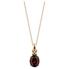 Sunita Nahata Grenat rouge 3.23ct. Pendentif en 14 carats avec diamant blanc.
