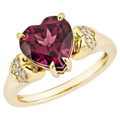 Sunita Nahata  Rhodolith 3,24ct. Fancy Ring aus 18KYG mit weißem Diamant.