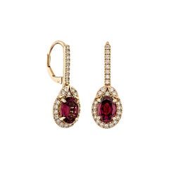 Sunita Nahata Rhodolite 3.29ct. Drop Earring in 18KRG with White Diamond.