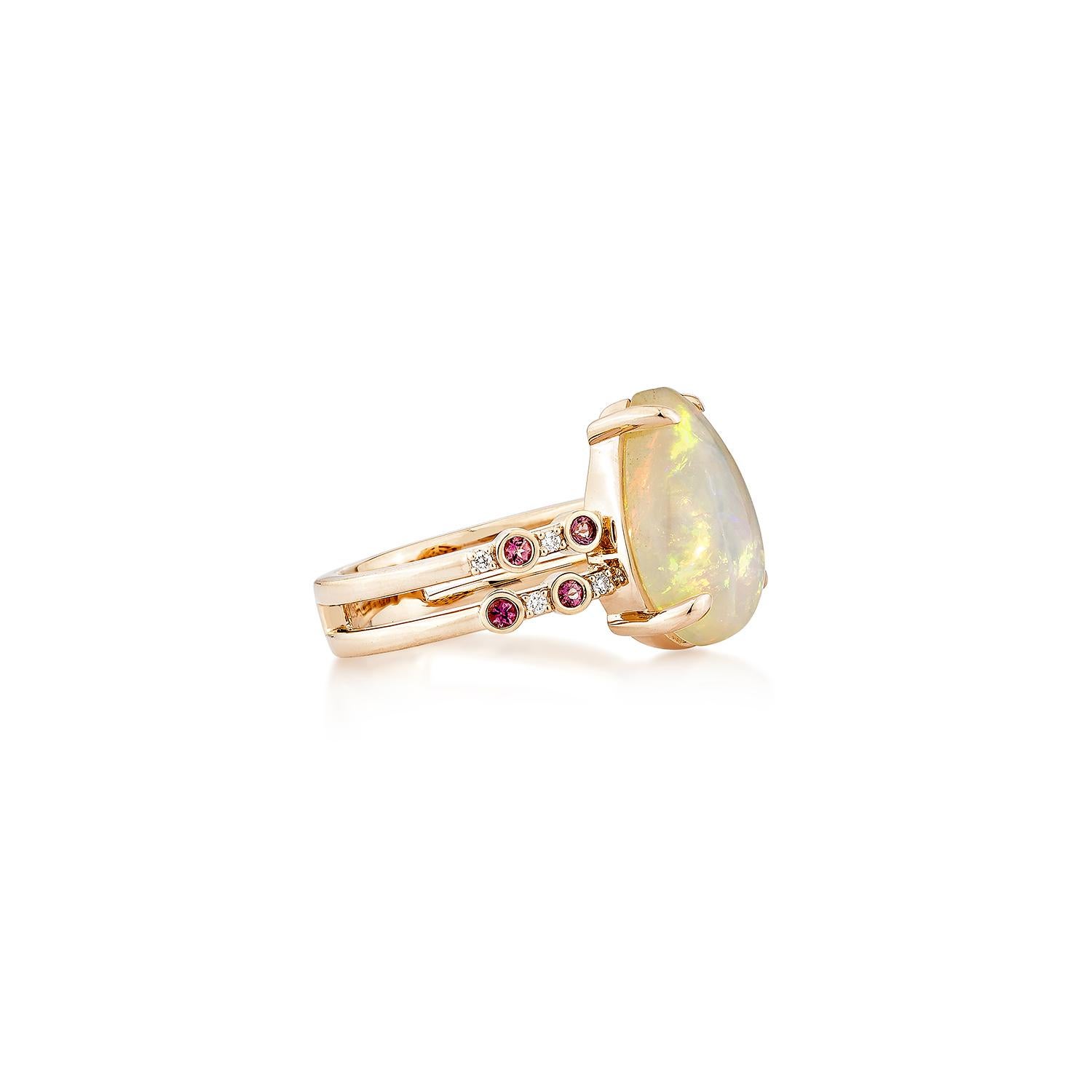 A stunning Opal and Pink Tourmaline Fancy Ring in 18K Rose Gold, accented with shimmering diamonds for a touch of elegance.
  
Opal & Pink Tourmaline Fancy Ring in 18KRG with Diamond.
    
Opal: 3.34 carat, 14X10mm size, pear shape. 
Pink