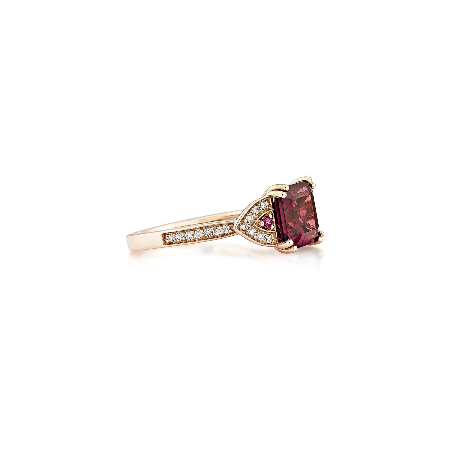 Sunita Nahata presents an elegant Rhodolite fancy ring in an octagon shape, set with sparkling white diamonds. This exquisite piece exudes grace and elegance, making it perfect for both daily wear and special occasions. Crafted from 14-karat rose