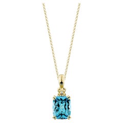 Sunita Nahata topaze bleue suisse 3,50 carats. Pendentif en 14 carats avec diamant blanc.