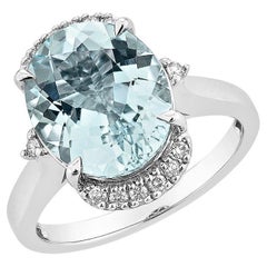 Sunita Nahata Aguamarina 3.81ct. Anillo de fantasía en 18KWG con diamante blanco.