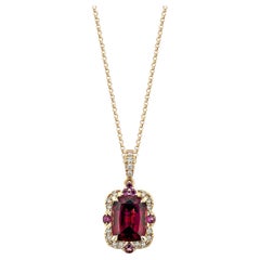 Sunita Nahata Rhodolite 3.94ct. Pendant in 18KRG with White Diamond.