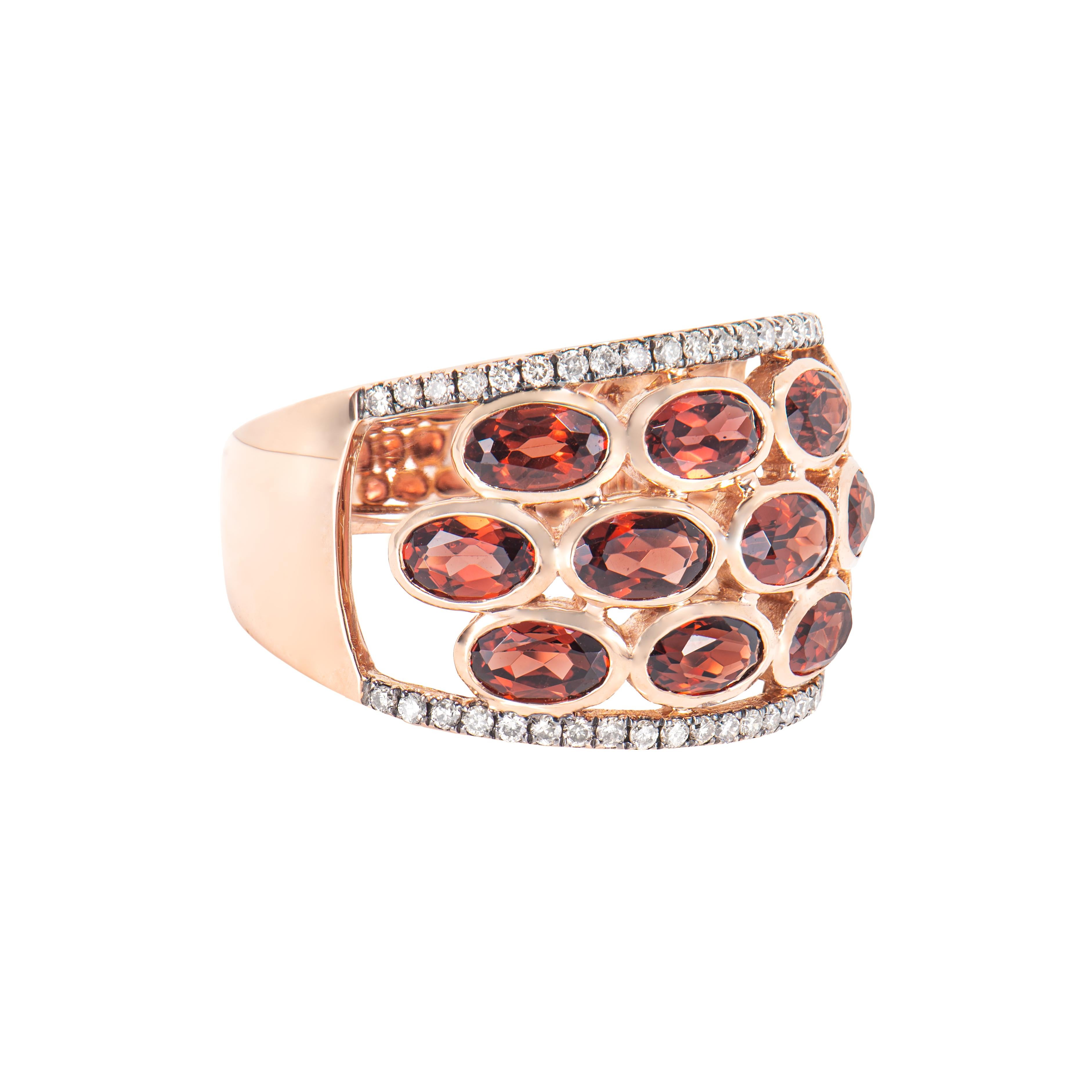 Presented Red Garnet Ring is perfect for people who want to wear it to any occasion or celebration. Its captivating garnet, and brown diamond set in 14karat rose gold, intended to charm hearts and elevate any special occasion.

Red Garnet Fancy Ring