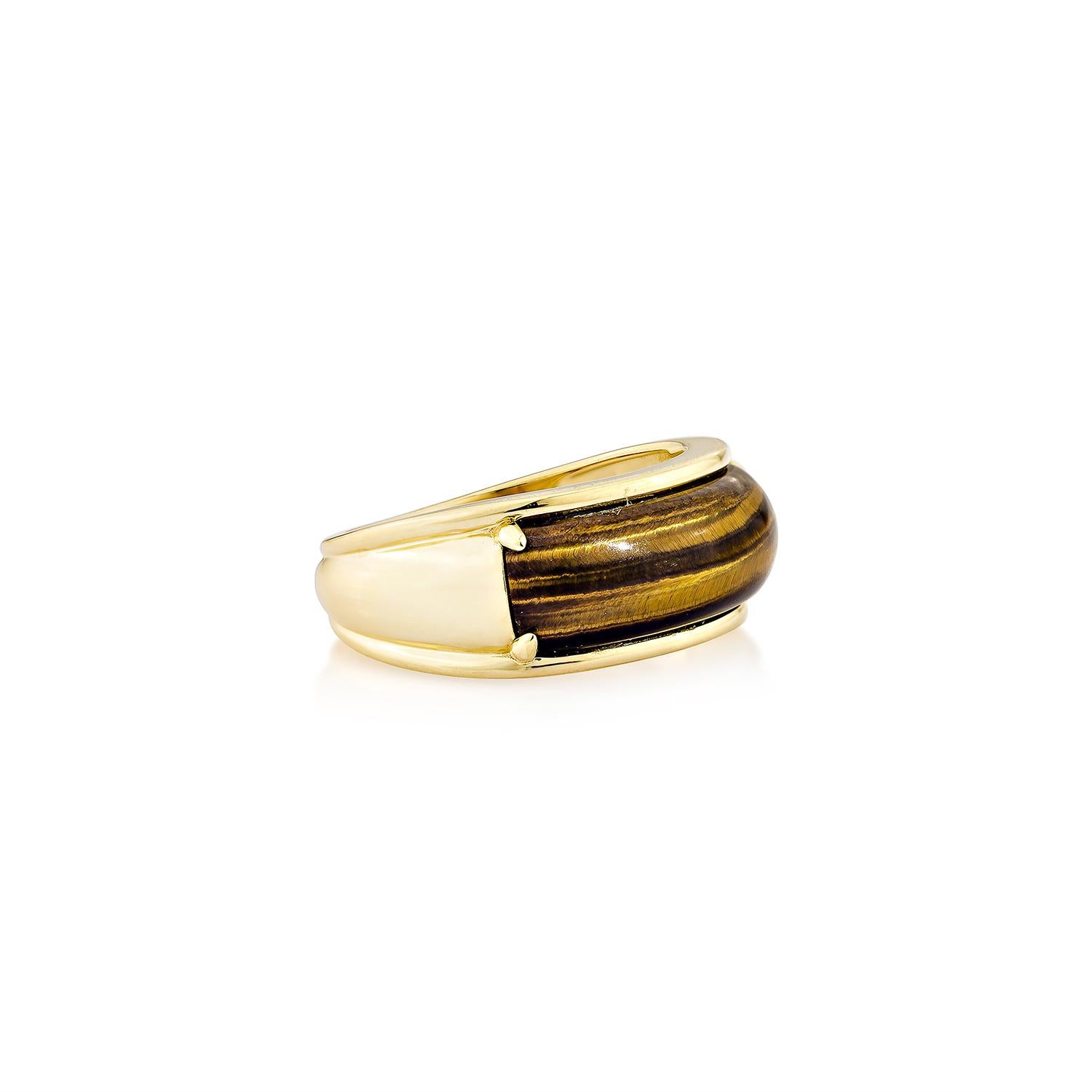 Bold and timeless, this Tiger’s Eye Fancy Ring in 18K Yellow Gold exudes strength and sophistication. The rich golden-brown hues of the tiger’s eye gemstone shimmer with chatoyancy, set in a sleek gold band for a refined yet powerful statement.
 