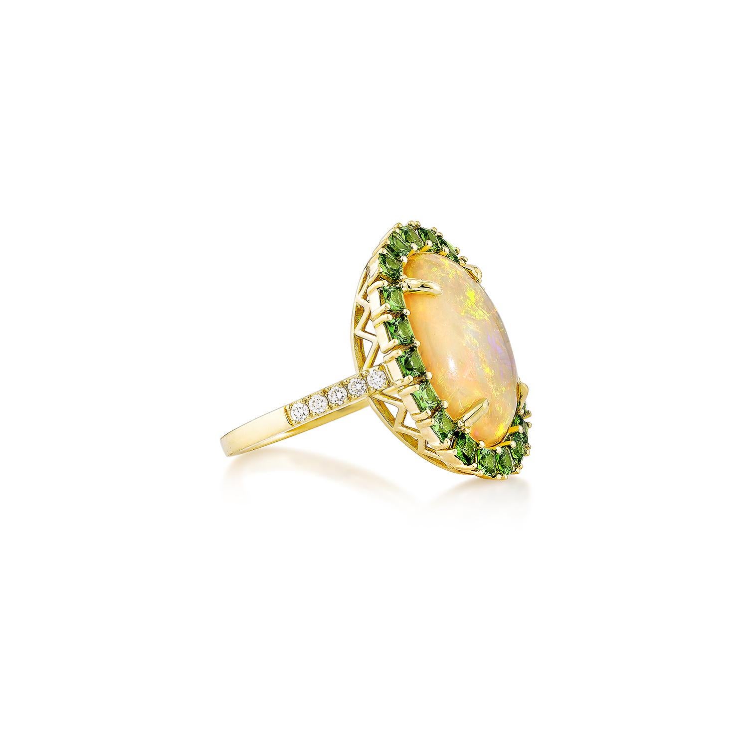An elegant 18K yellow gold ring featuring a luminous oval-shaped opal, a vibrant princess-cut tsavorite, and sparkling diamond accents—a perfect blend of color and sophistication.

Opal & Tsavorite Fancy Ring in 18KYG with Diamond.

Opal: 4.31