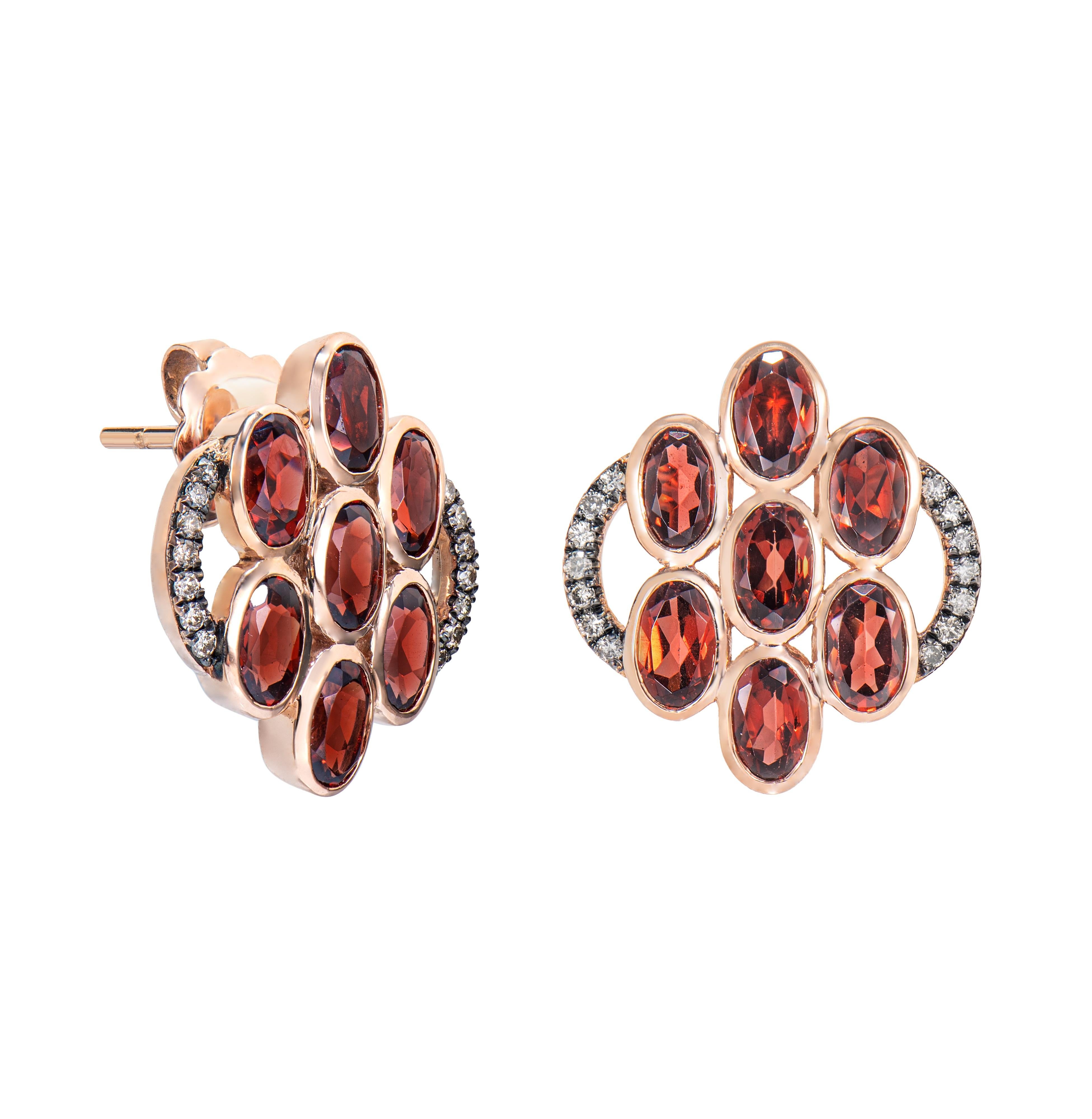 Presented A Pair of Red Garnet Earrings is perfect for people who want to wear it to any occasion or celebration. Its captivating garnet, and brown diamond set in 14karat rose gold, intended to charm hearts and elevate any special occasion.

Red