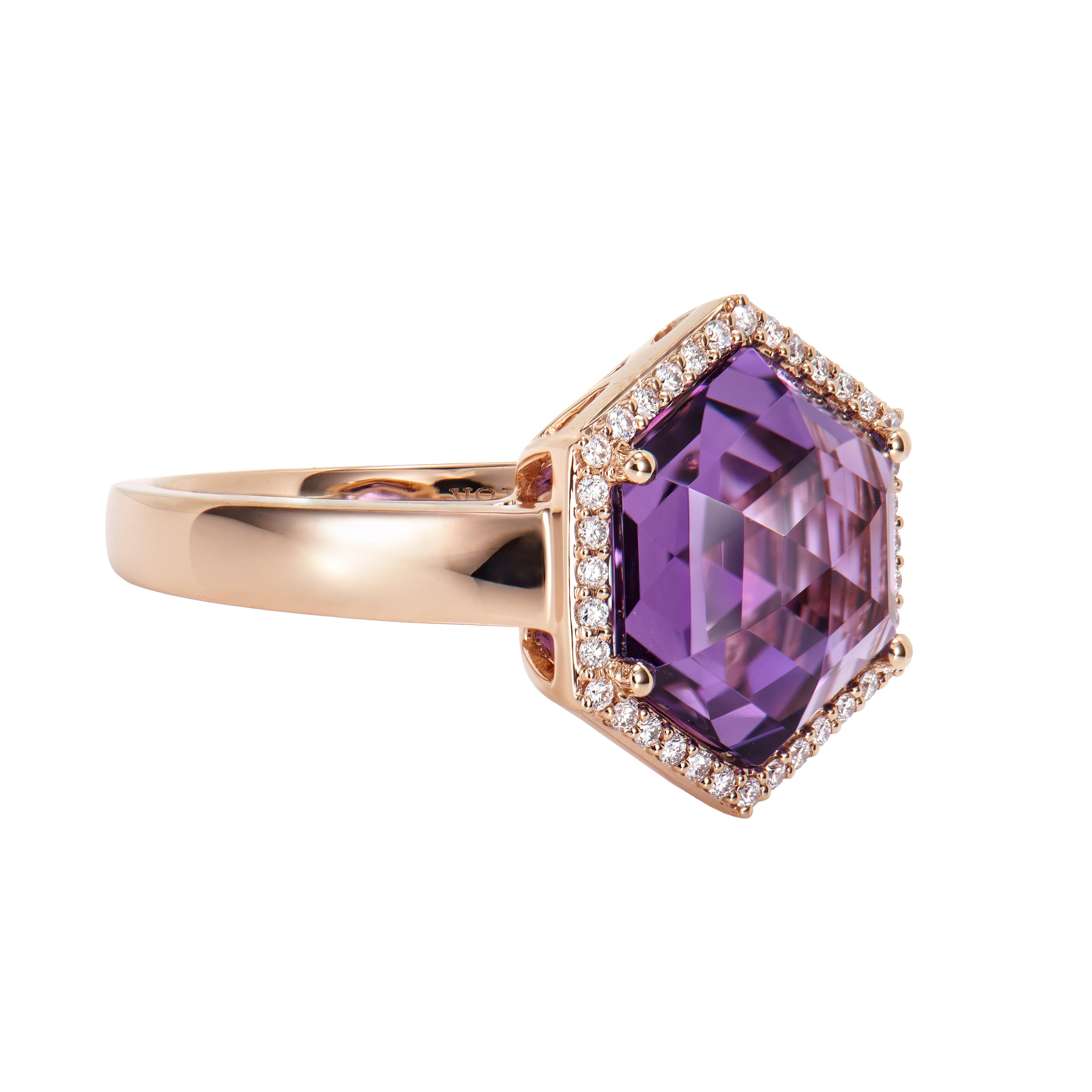 This is fancy Amethyst Ring in hexagon briolette shape purple hue. The Ring is elegant and can be worn for many occasions. The Amethyst around the ring add to the beauty and elegance of the ring.
  
Amethyst Fancy Ring in 18Karat Rose Gold with