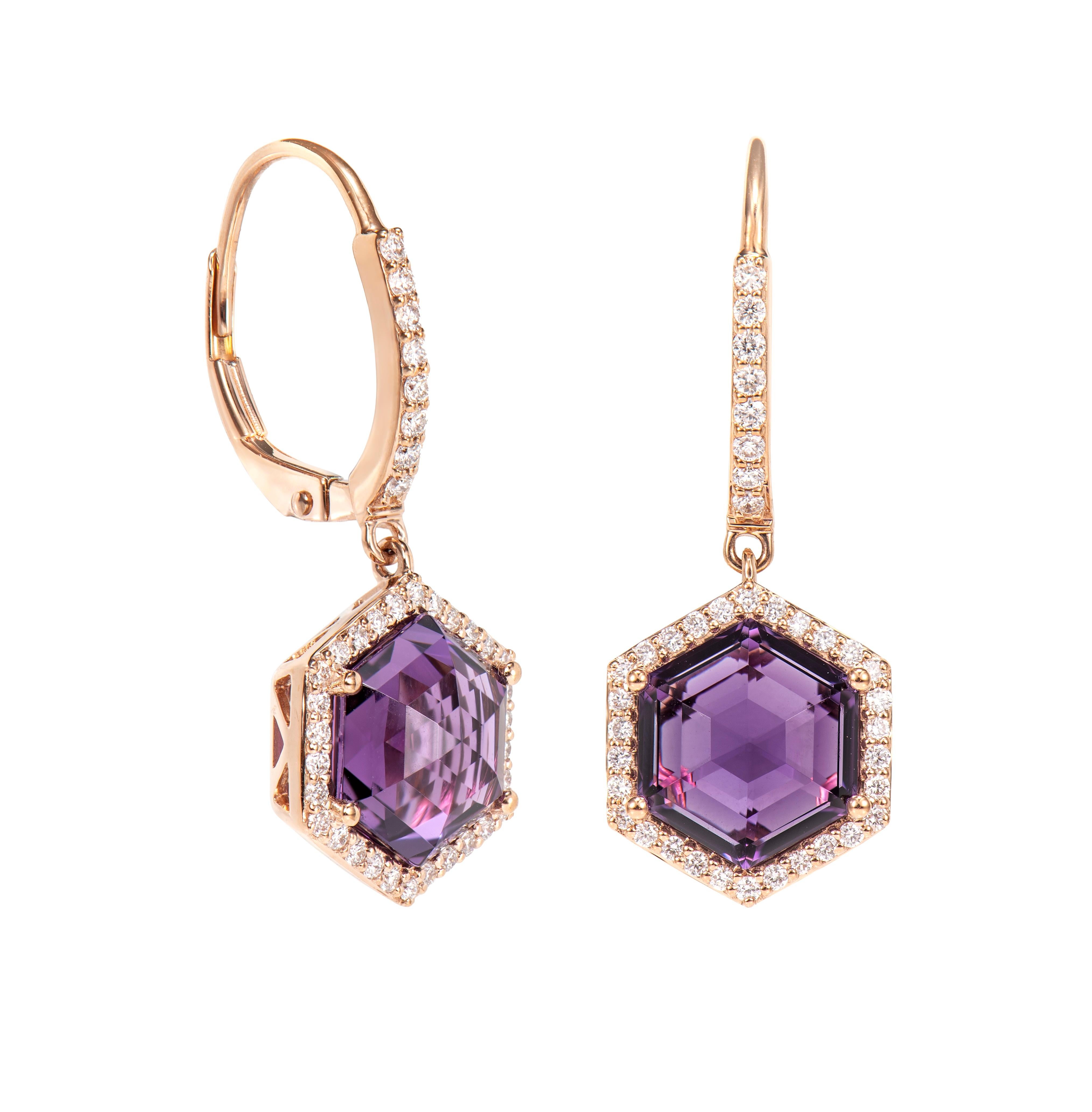 This is Amethyst Drop earrings in hexagon briolette shape purple hue. The earrings is elegant and can be worn for many occasions. The Amethyst around the Earrings add to the beauty and elegance of the Earrings.

Amethyst Drop Earrings in 18Karat