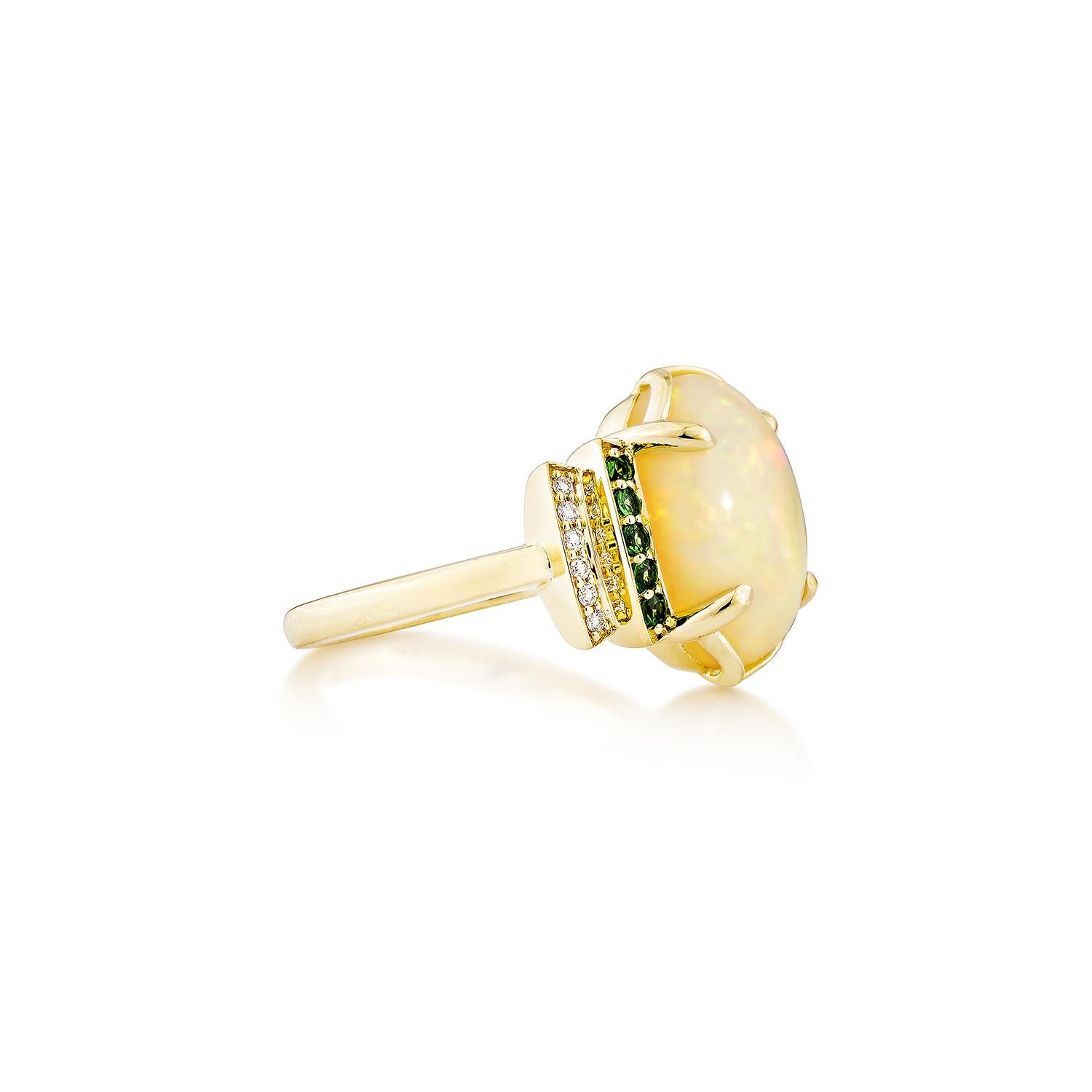 Sunita Nahata presents a stunning Ethiopian opal cabochon ring, adorned with  tsavorite and white diamonds. This gemstone, renowned for its historical significance, is believed to bring good luck, protection, and divine hope. Its metaphysical