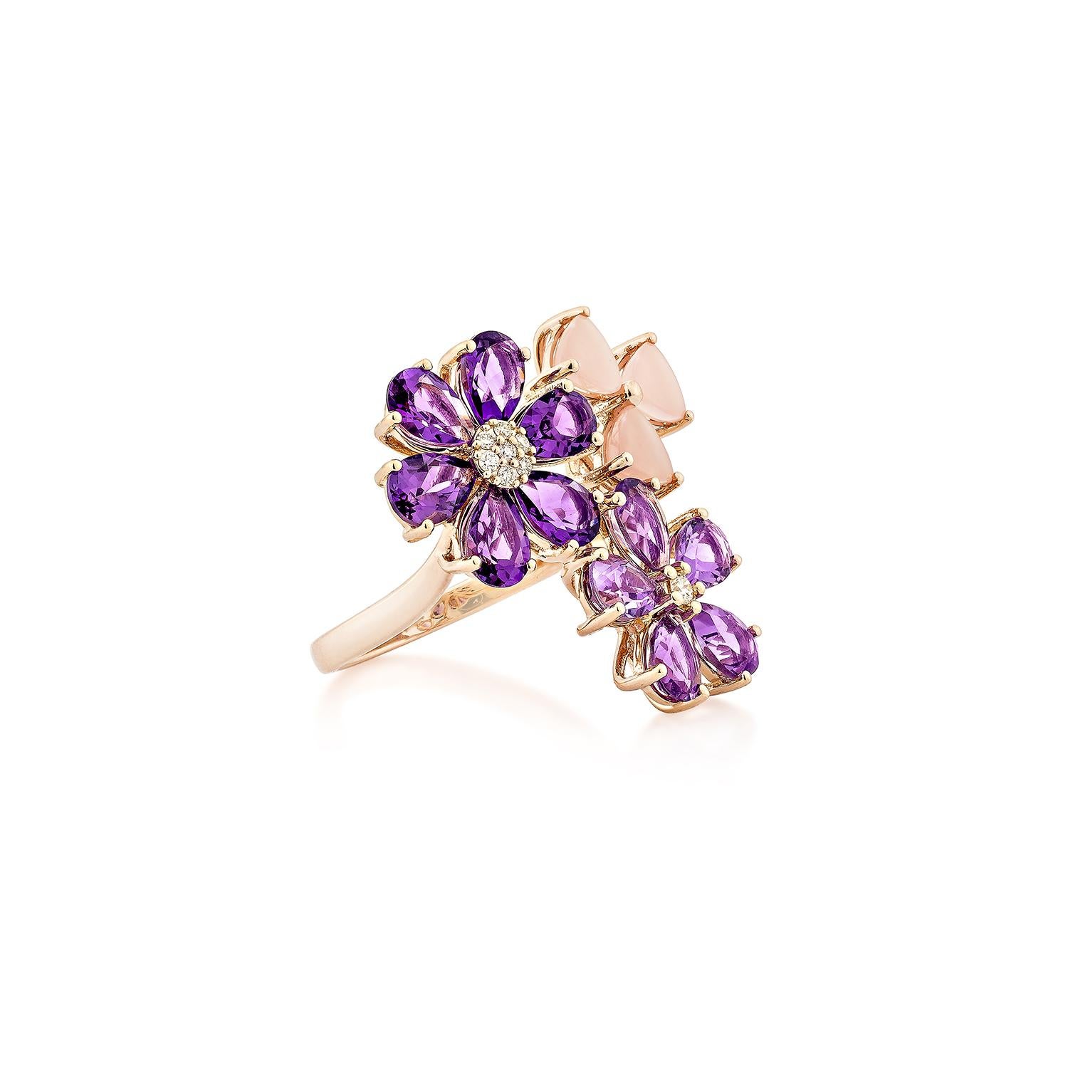 A captivating floral-inspired cocktail ring featuring a harmonious blend of gemstones. Two exquisite flowers bloom with pear-shaped dark and light amethysts, their brilliance accentuated by a sparkling cluster of white diamonds at the center. Above