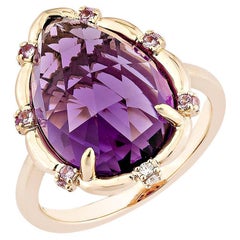 Sunita Nahata Amethyst 6.35ct. Ring in 18KRG with sapphire & White Diamond.