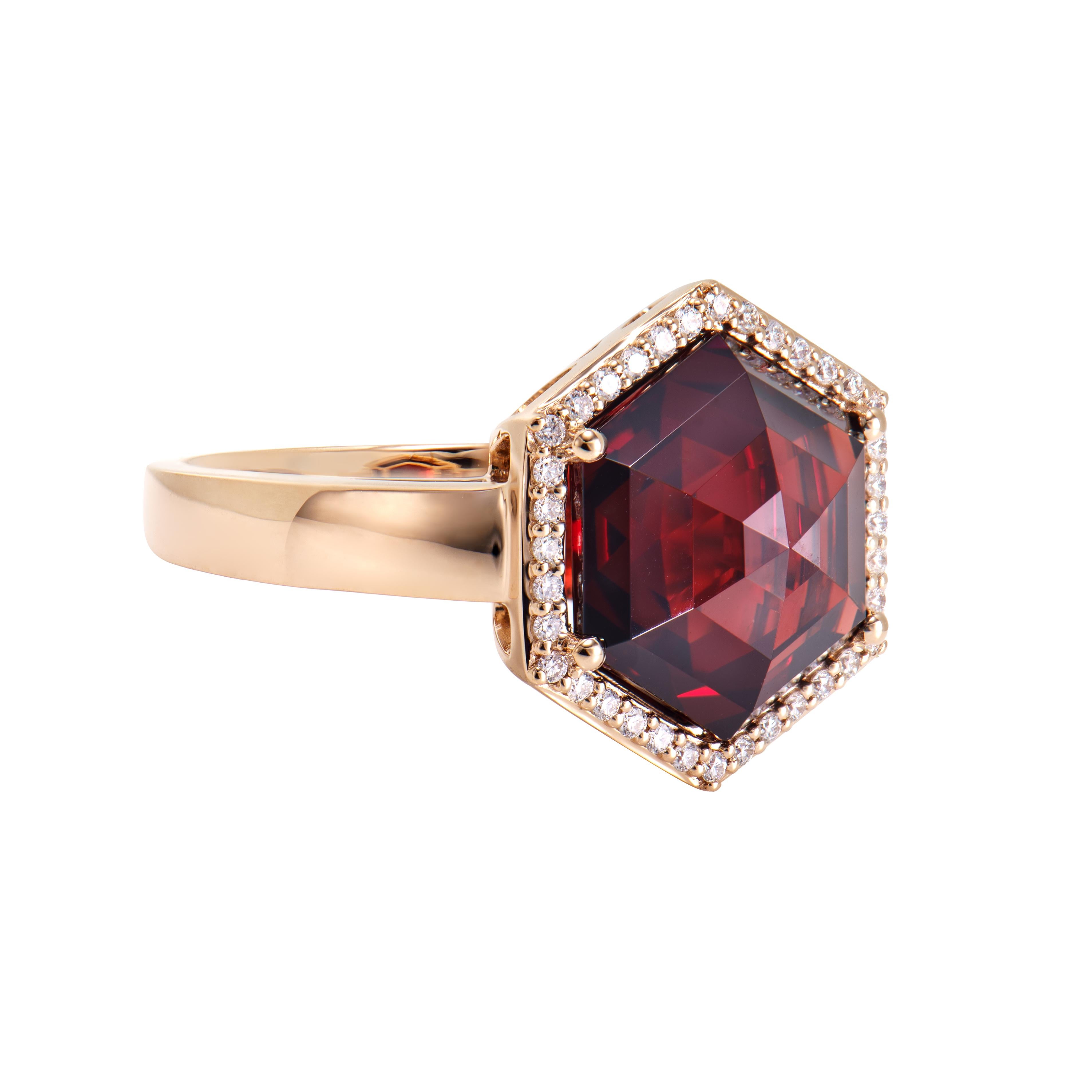 This is fancy Garnet Ring in hexagon briolette shape purple hue. The Ring is elegant and can be worn for many occasions. The Garnet around the ring add to the beauty and elegance of the ring.
  
Red Garnet Fancy Ring in 18Karat Rose Gold with White