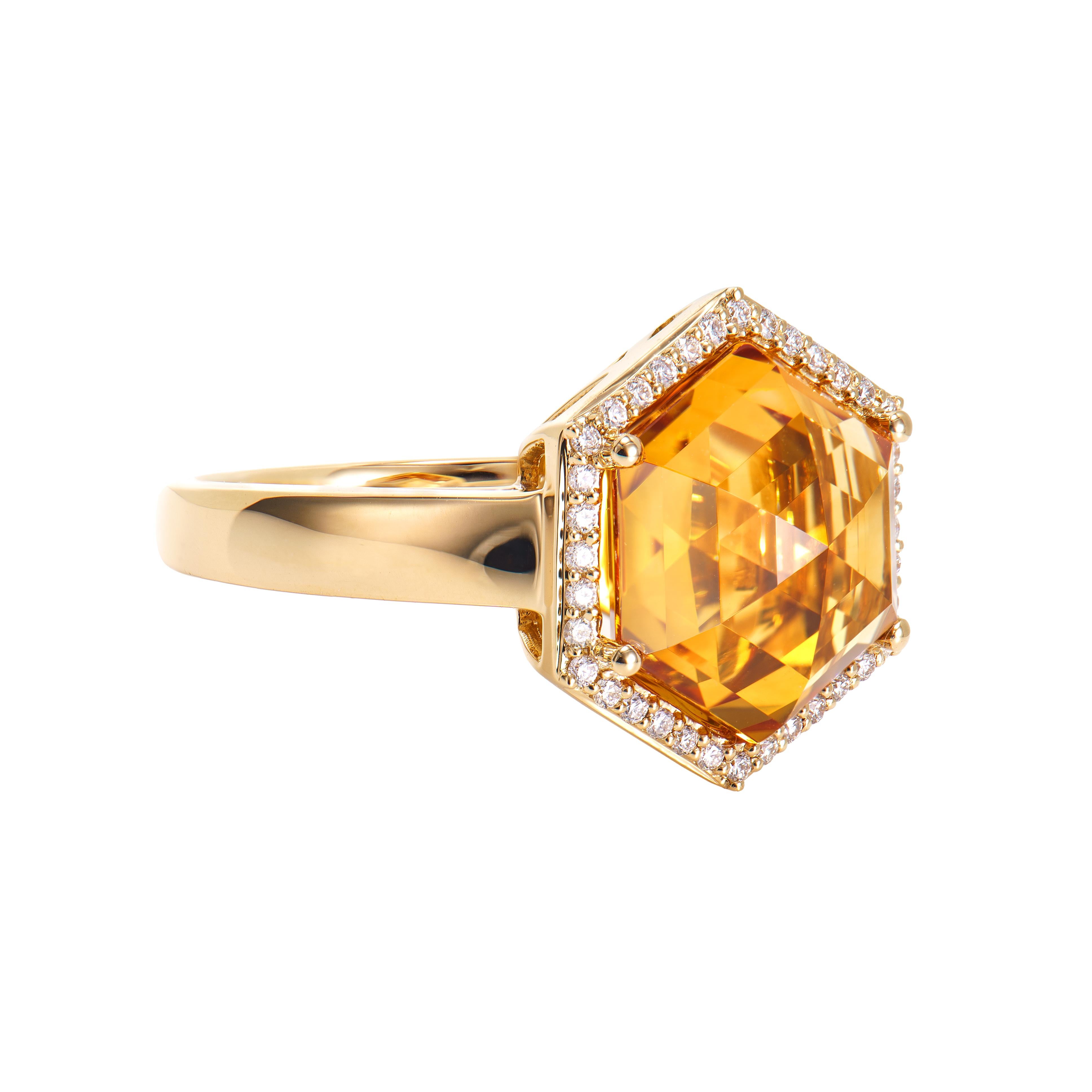 This is fancy Citrine  Ring in hexagon briolette shape purple hue. The Ring is elegant and can be worn for many occasions. The Citrine around the ring add to the beauty and elegance of the ring.
  
Citrine Fancy Ring in 18Karat Yellow Gold with