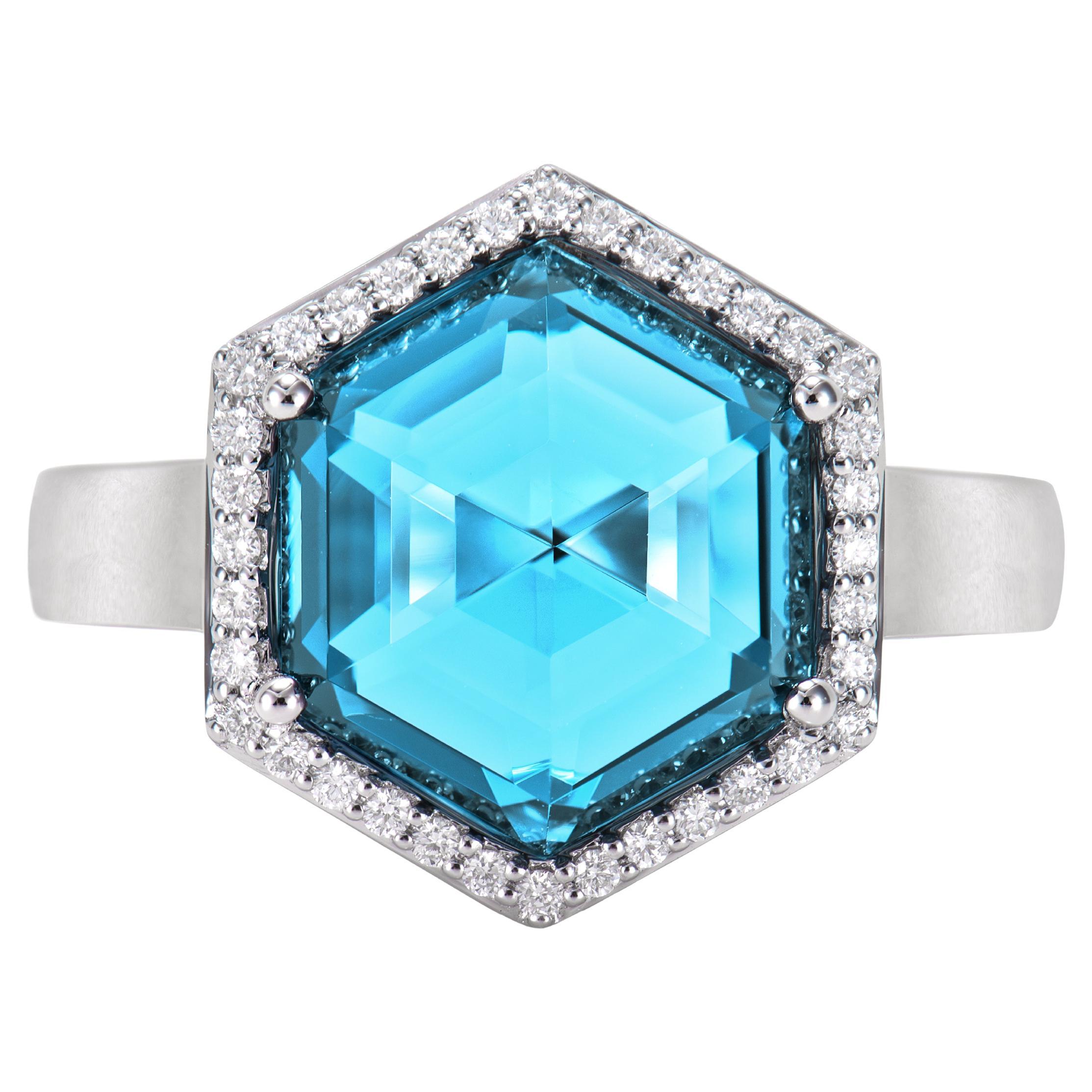Sunita Nahata Swiss Blue Topaz 6.76ct. Fancy Ring in 18KWG with Diamond.