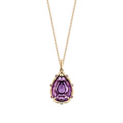 Sunita Nahata Amethyst 6.83ct. Pendant in 18KRG with Pink Sapphire & Diamond.