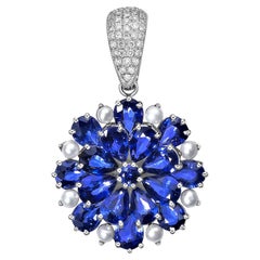 Sunita Nahata Blue sapphire & Pearl 7.30ct. Pendant in 18KWG with Diamond.