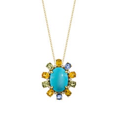 Sunita Nahata Turquoise & Mix Sapphire 7.39ct. Pendant in 18KYG with Diamond.