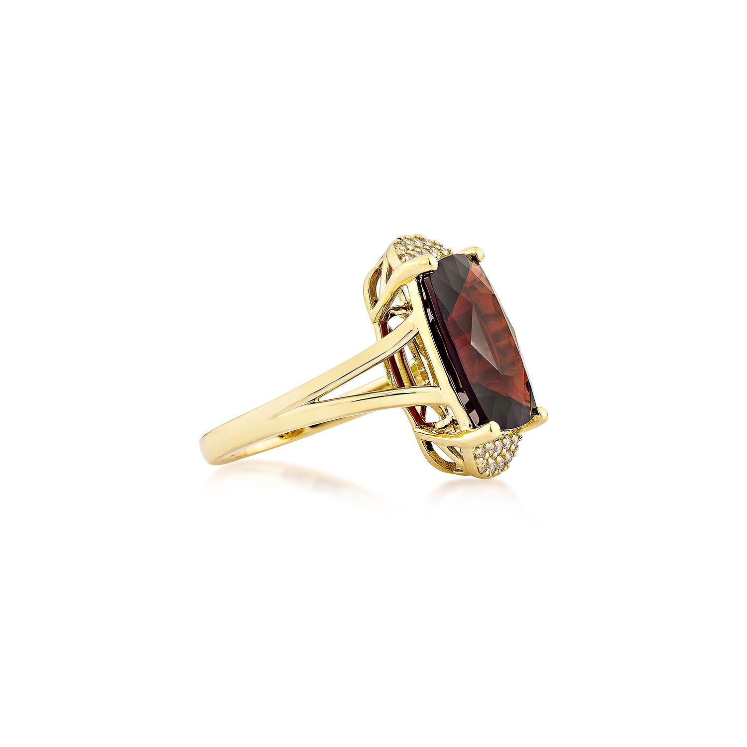 Presented A Fancy Ring of Red Garnet is perfect for people who want to wear it to any occasion or celebration. Its captivating garnet, and white diamond set in 18karat yellow gold, intended to charm hearts and elevate any special occasion.
  
Red