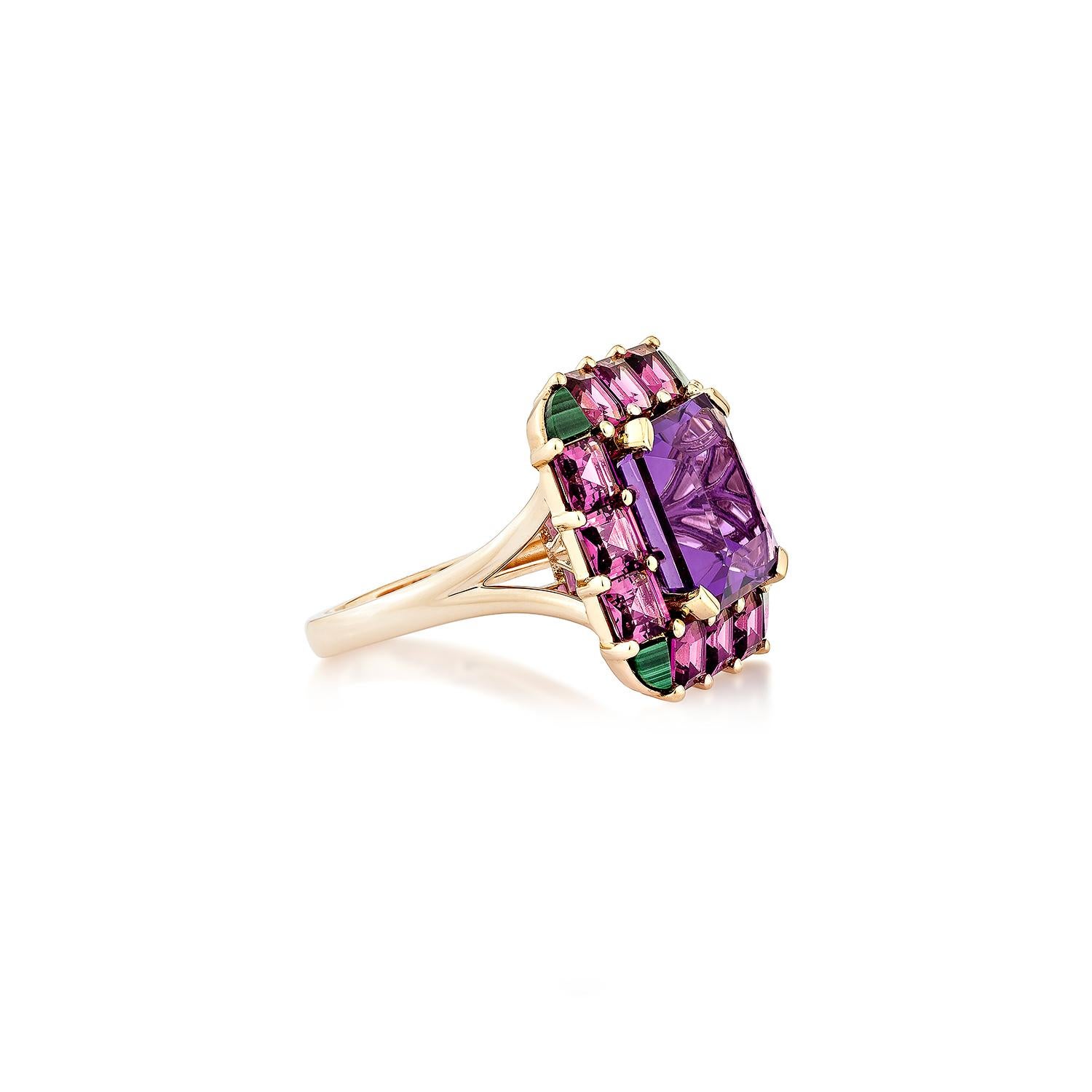 This lovely amethyst ring is set in an octagon shape! The malachite that embrace the ring's four corners add to its beauty and elegance. This trendy ring is suitable for any event or gathering. Thiis ring accented with Rhodolite, malachite and