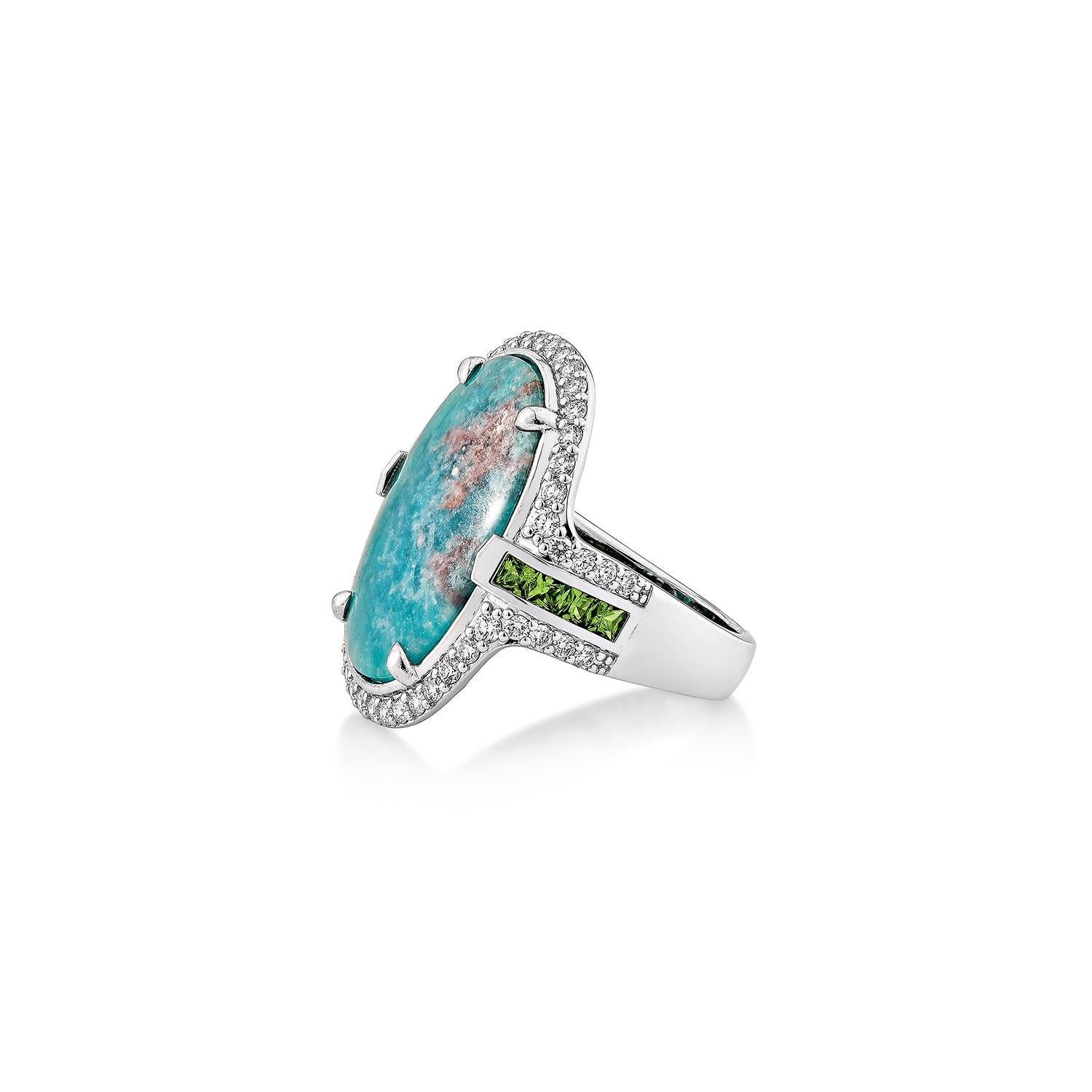 Oval Cut Sunita Nahata Paraiba 8.50ct. Fancy Ring in 18KWG with Tsavorite and Diamond. For Sale