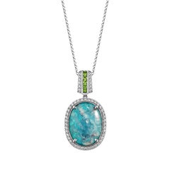 Sunita Nahata Paraiba 9.22ct. Pendant in 18KWG with Tsavorite and Diamond.
