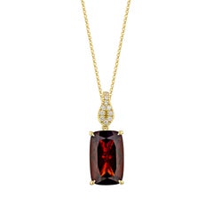 Sunita Nahata Red Garnet 9.37ct. Pendant in 18KYG with White Diamond.