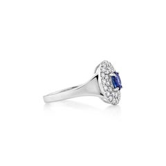 Sunita Nahata Blue Sapphire 0.56ct. Fancy Ring in 18KWG with Diamond.