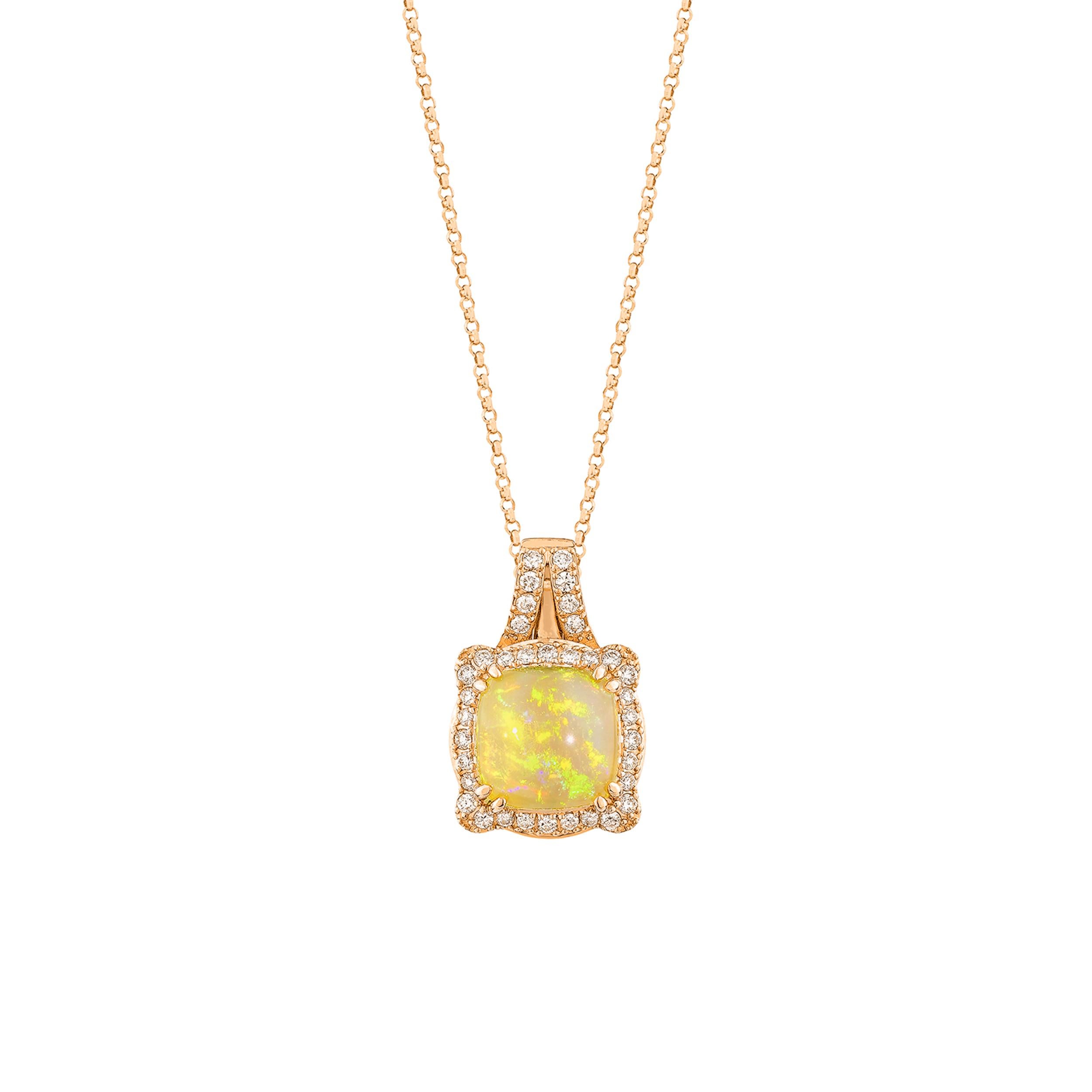 Sunita Nahata presents a stunning Ethiopian opal cabochon pendant, adorned with white diamonds. This gemstone, renowned for its historical significance, is believed to bring good luck, protection, and divine hope. Its metaphysical benefits include