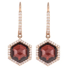 Sunita Nahata Granate 8.40ct. Pendientes de gota en 18KRG con diamante.
