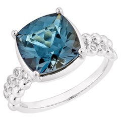 Sunita Nahata London Blue Topaz 5.01ct. Fancy Ring in 14KWG with Diamond.