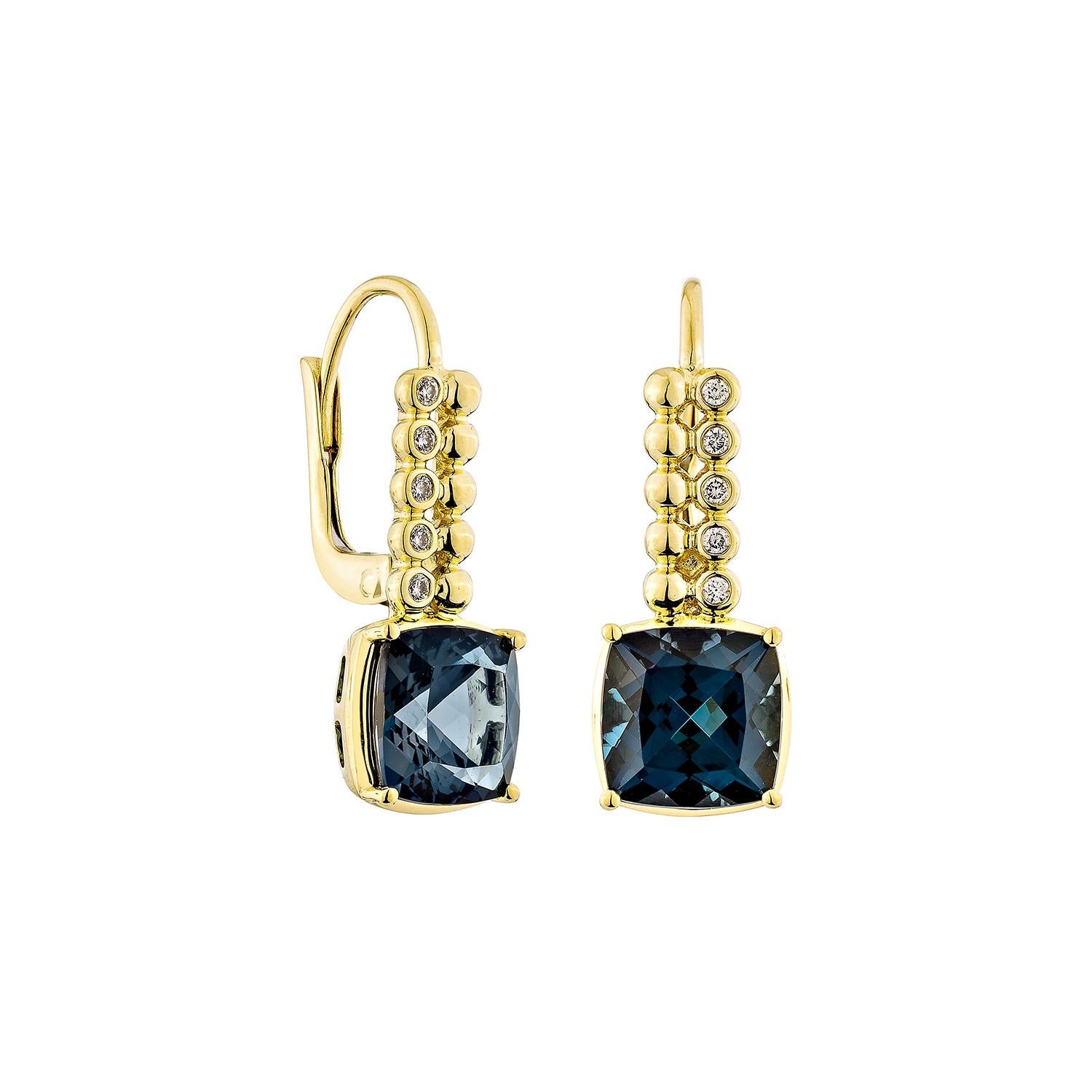 Sophisticated and captivating, these drop earrings feature cushion-shaped London blue topaz gemstones, elegantly paired with shimmering white diamonds. Crafted in 14K yellow gold, they offer a timeless allure for any occasion.

London Blue Topaz
